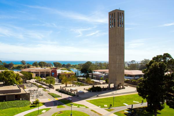 Image of Storke Tower from the air, with bike paths in the foreground